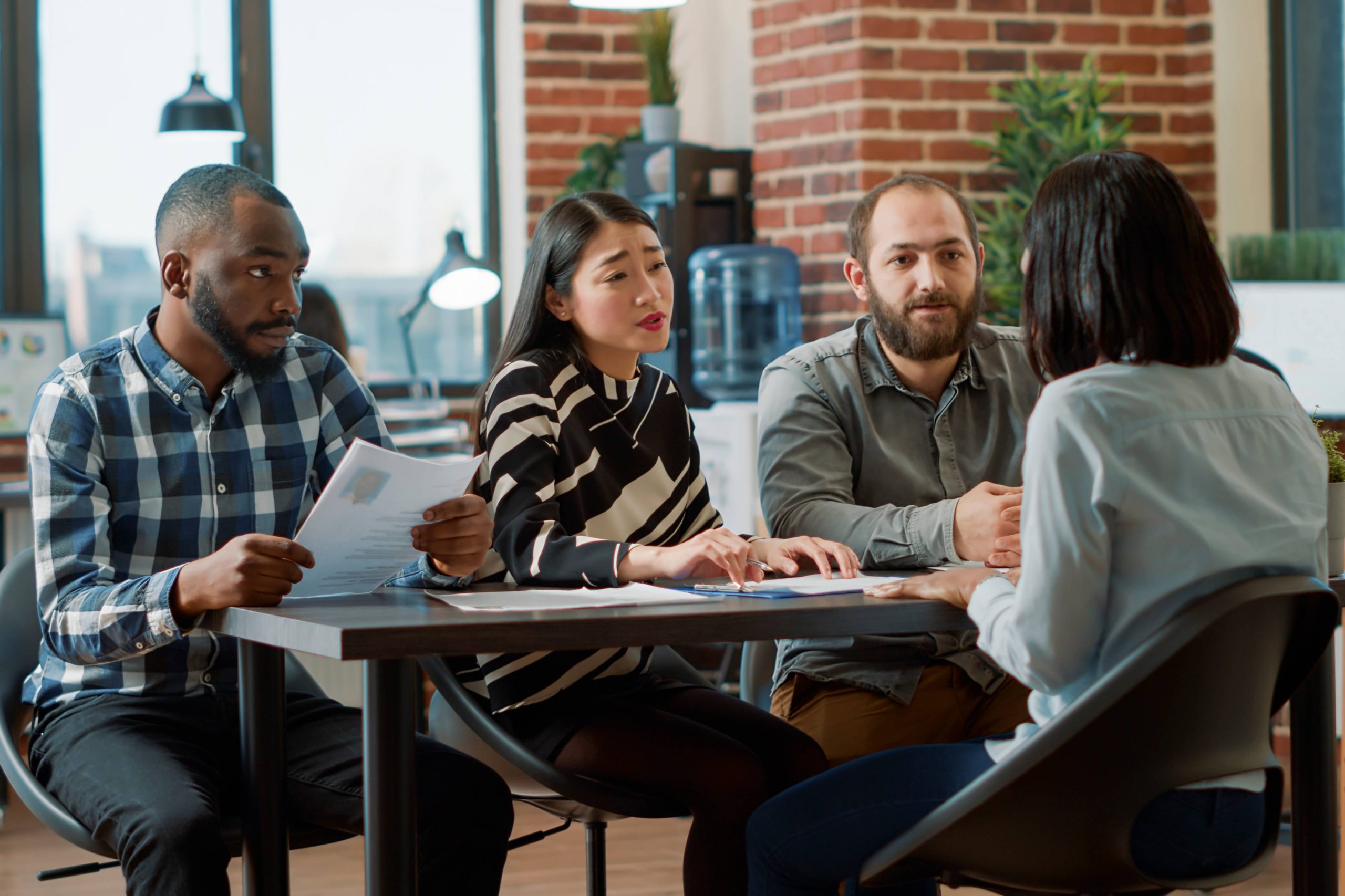 Angry women leaving job meeting after getting dismissed losing employment
